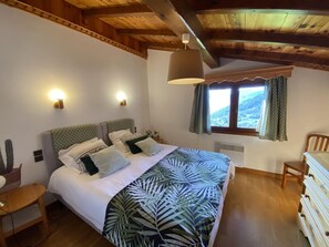 3 habitaciones, tabla de planchar con plancha y cuna de viaje
