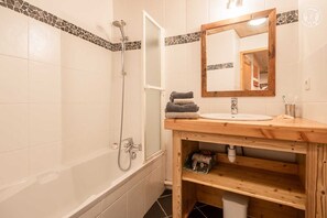 Bathtub, hair dryer