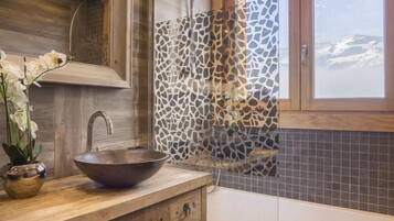 Bathtub, hair dryer, towels