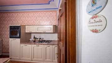 Fridge, oven, cookware/dishes/utensils