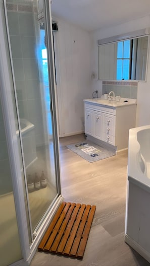 Shower, hair dryer, towels, soap
