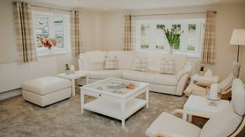 Casa, varias camas | Área de sala de estar