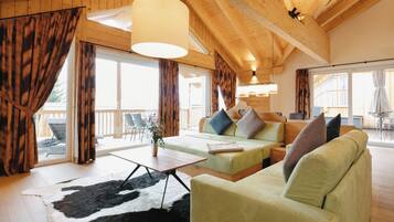 Apartment | Living area | 42-inch flat-screen TV with satellite channels, heated floors
