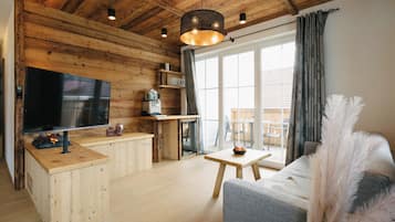 The nest with private sauna | Living area | 108-cm flat-screen TV with satellite channels, heated floors