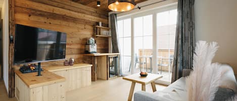 Das Nest mit privater Sauna | Wohnbereich | 108-cm-Flachbildfernseher mit Satellitenempfang, Fußbodenheizung