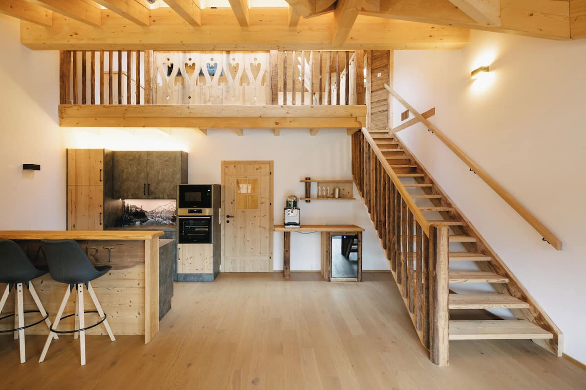 Clearly two-storey with private sauna | Living area | 108-cm flat-screen TV with satellite channels, heated floors