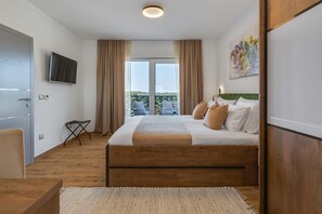 4 chambres, coffres-forts dans les chambres, fer et planche Ă repasser