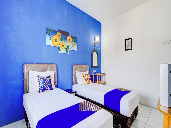 Economy Twin Room | Desk, laptop workspace, free WiFi, bed sheets - Hotel O Edotel Tebe Syariah (Malang)