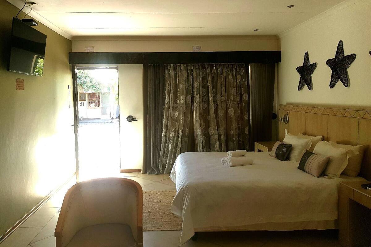 Kamar Eksekutif | 1 kamar tidur, minibar, meja kerja, dan ruang kerja ramah laptop