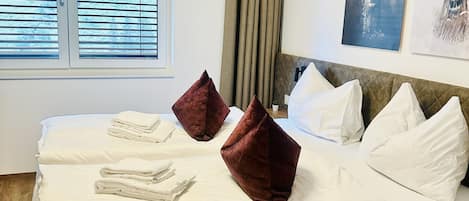 1 slaapkamer, een strijkplank/strijkijzer, gratis wifi, beddengoed