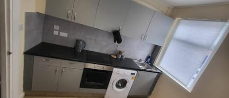 Apartment, Multiple Beds | Private kitchen