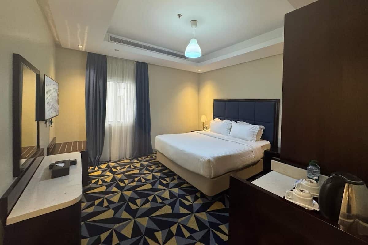 Deluxe Room | 2 bedrooms, hypo-allergenic bedding, pillowtop beds, in-room safe