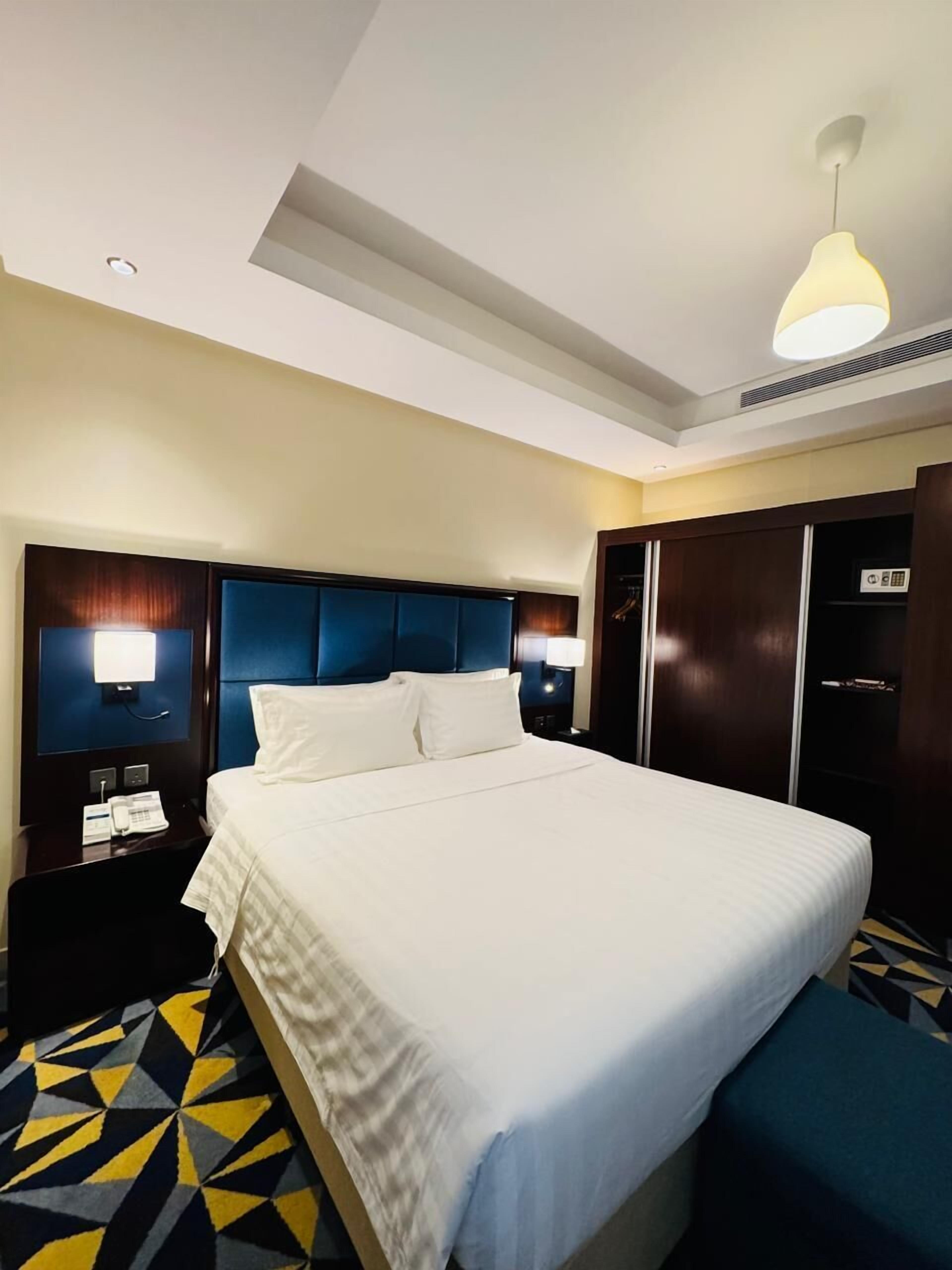 Chambre Deluxe | Literie hypoallergénique, surmatelas, coffres-forts dans les chambres
