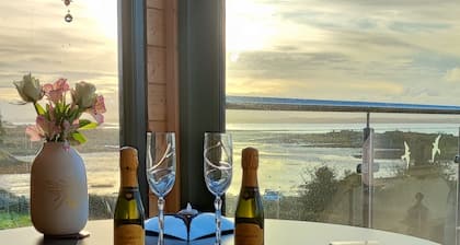 Set on an elevated private site with commanding views over Strangford Lough.