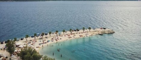 Beach nearby, black sand, free beach shuttle, beach umbrellas