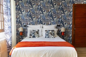 Family Room | Premium bedding, blackout drapes, free WiFi, bed sheets