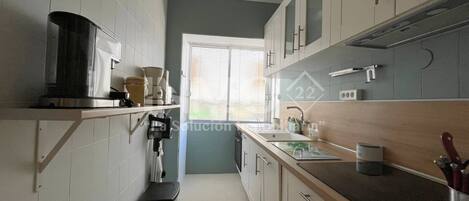 Fridge, microwave, dishwasher, coffee/tea maker