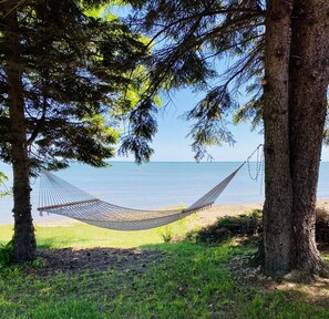 On the beach, sun-loungers, beach towels