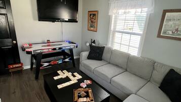 Smart TV, fireplace, books