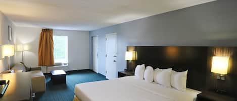 Suite, 1 King Bed | 1 bedroom, desk, blackout curtains, iron/ironing board