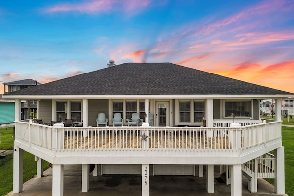 Retreat to a large deck and yard at this family and pet friendly home