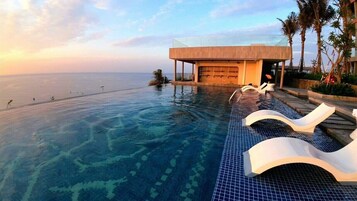 2 outdoor pools, open 6:00 AM to 8:00 AM, free cabanas, pool umbrellas