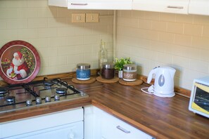 Mikrobølgeovn, ovn og kokeplater