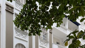 A white building with multiple balconies, a black gate, and a sign reading 'South Park Residence.' - 2 Minutes From Copacabana Beach Df408 (Rio de Janeiro)