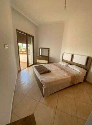 1 غرفة نوم وملاءات أسرّة