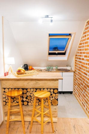 Suite Studio Design | Restauration dans la chambre