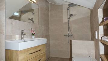 Superior Apartment, 2 Bedrooms, Sea View | Bathroom | Shower, rainfall showerhead, free toiletries, hair dryer