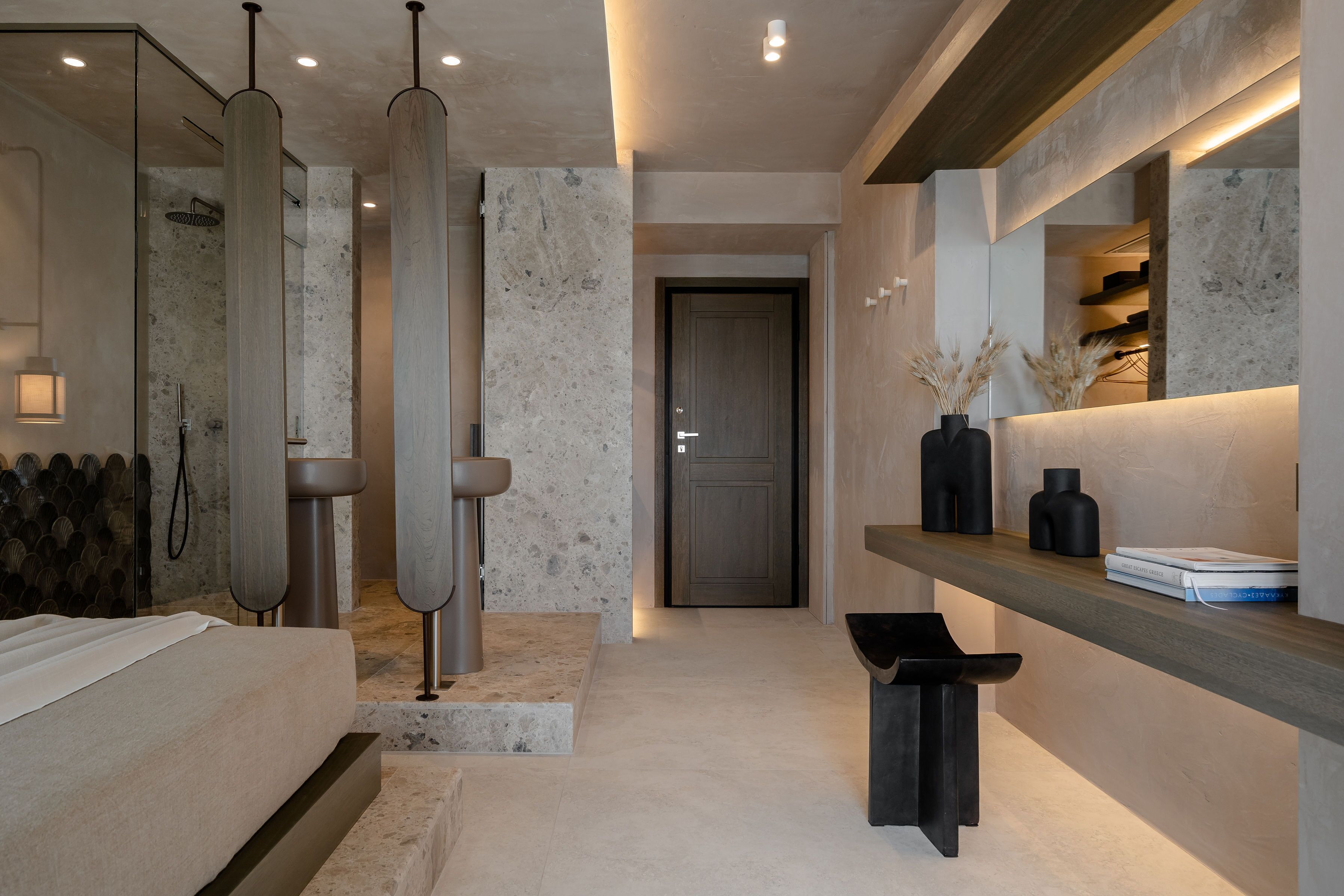 A modern bathroom with a shower, a sink, and a vanity with a mirror.