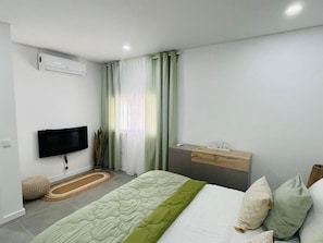 1 habitación, tabla de planchar con plancha, wifi y ropa de cama 