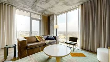 Luxury Condo, 1 King Bed with Sofa bed, City View | Living area | 55-inch Smart TV with digital channels