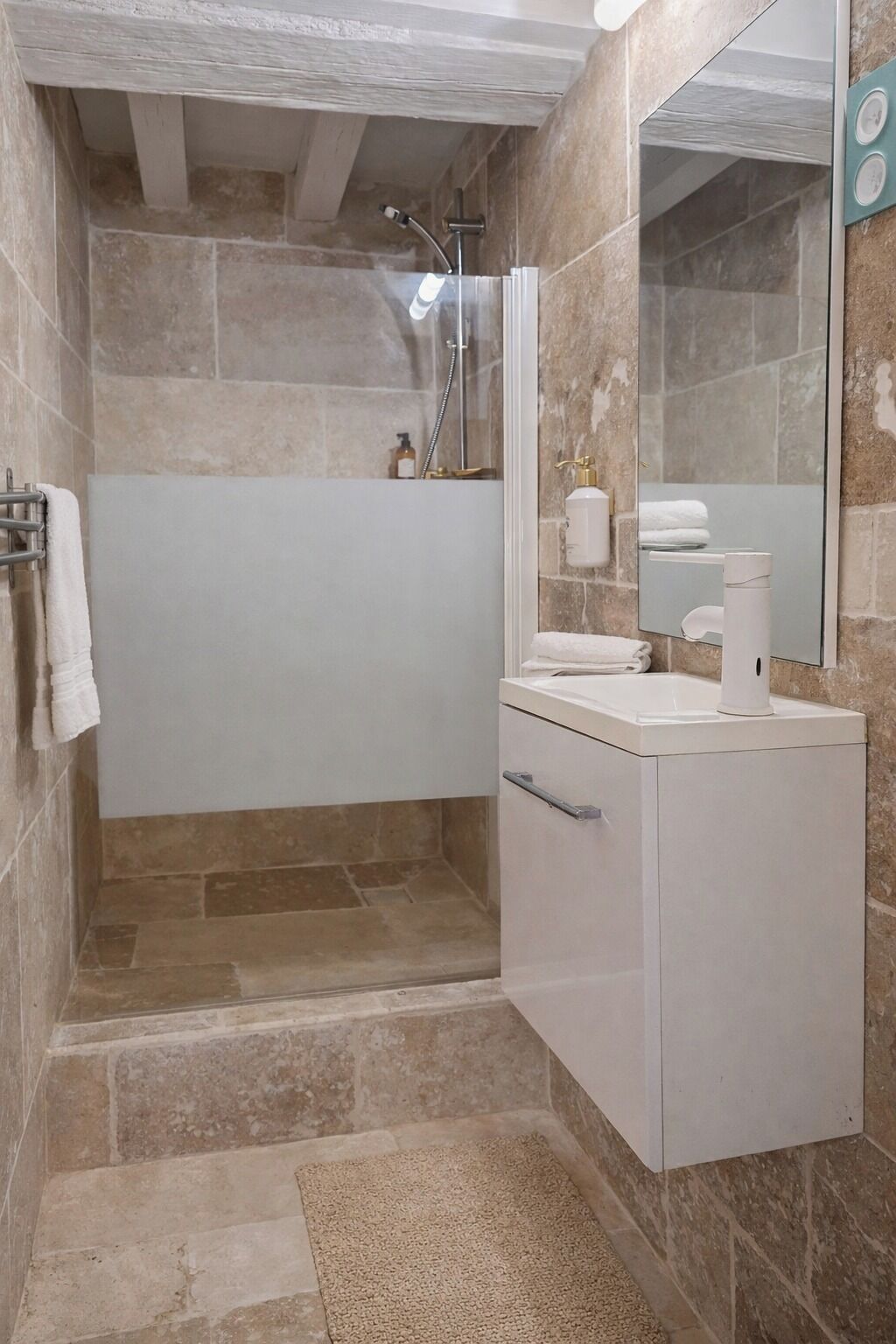 Shower, towels, toilet paper