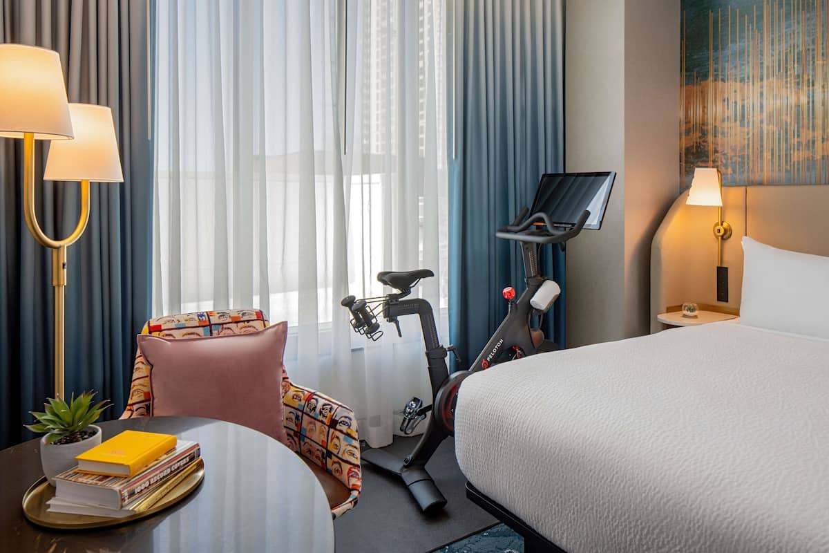 Room, 1 King Bed (Peloton Spin Bike) | In-room safe, desk, laptop workspace, blackout curtains