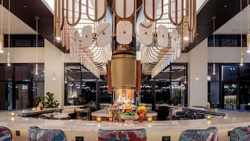 2 bars/lounges, lobby lounge, rooftop bar