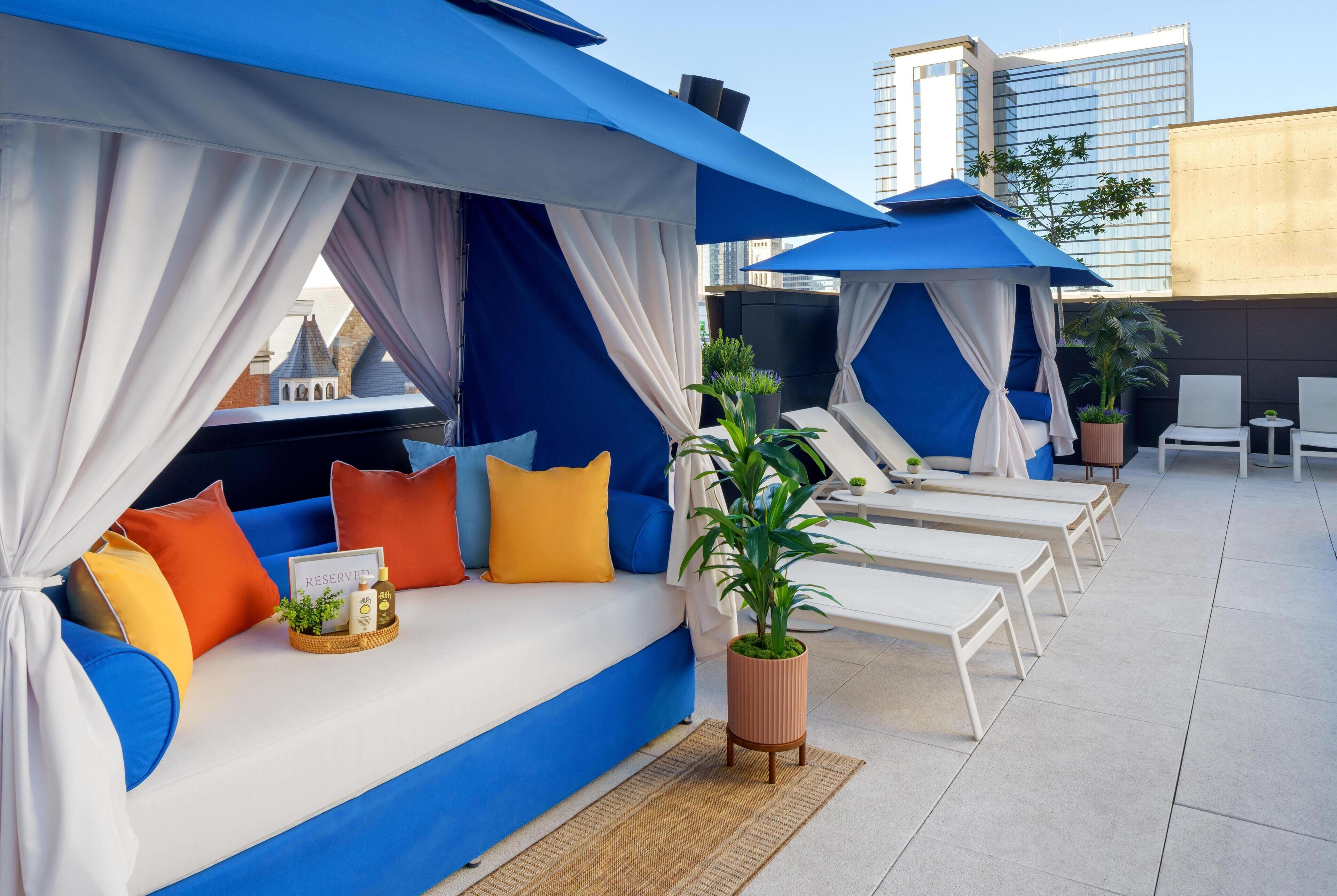 Seasonal outdoor pool, cabanas (surcharge), pool umbrellas