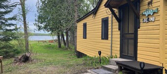 Cozy 1950’s lake front cabin with beautiful sunsets!