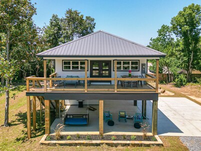 New cottage blocks from the beach; pets OK! Firepit!  Grill! EV Charger! 65” TV