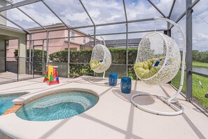 Outdoor spa tub - Stunning, designer furnished 7th Heaven Villa! Resort home, large pool, 4 master suites (Kissimmee)