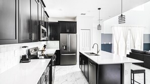 Fridge, microwave, oven, stovetop - Family Villa w/ Themed Rooms, Pool & Resort Access (Davenport)