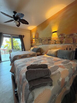 Superior Double Room | Pillowtop beds, minibar, in-room safe, individually decorated - Hotel El Caballo Blanco (Mahahual)