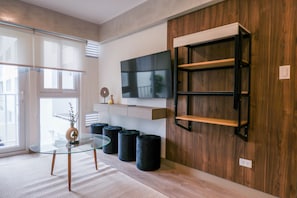 Apartamento conforto | Área de estar | Smart TV