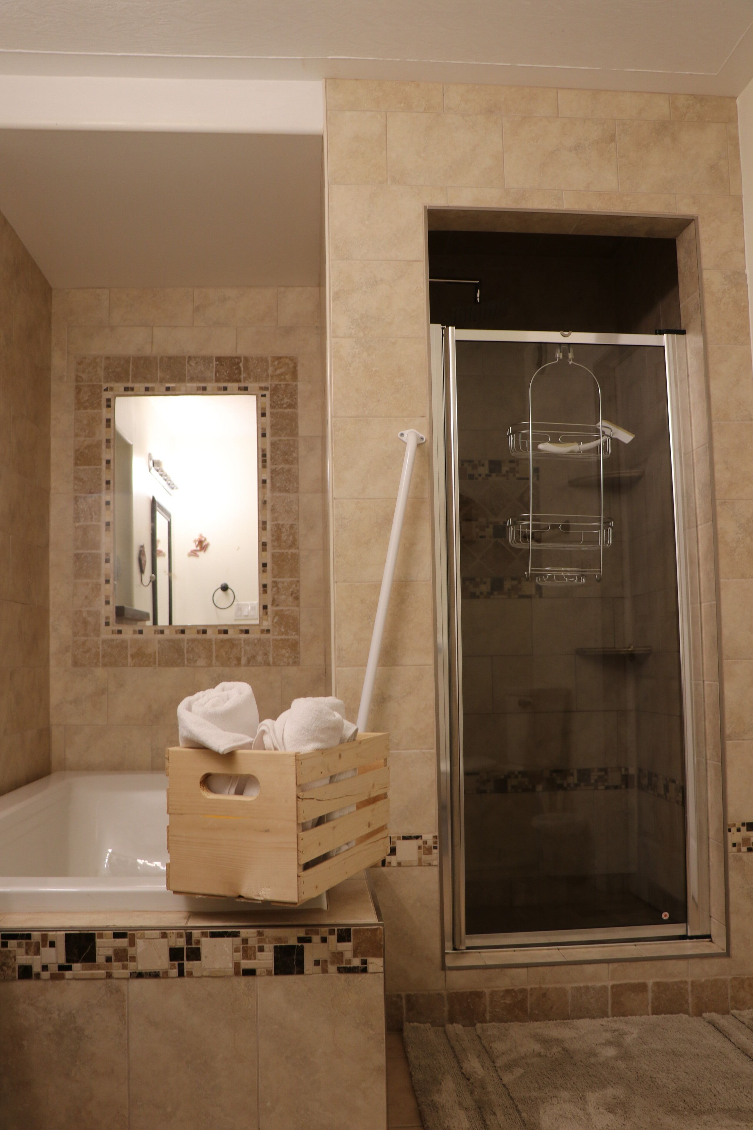 Shower, hair dryer, towels, toilet paper