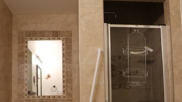 Shower, hair dryer, towels, toilet paper