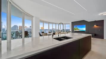 Luxury Apartment | Private kitchen | Fridge, microwave, oven, stovetop