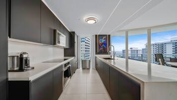 Luxury Apartment | Private kitchen | Fridge, microwave, oven, stovetop