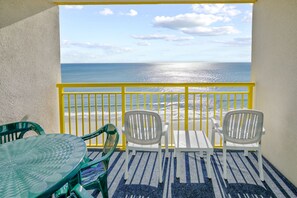 Outdoor dining - 17th floor oceanfront condo w/ balcony, free WiFi, central AC, shared hot tub (North Myrtle Beach)