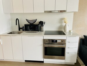 Refrigerador, microondas, parrilla de estufa y lavavajillas 